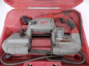 lot 14 image: Milwaukee Deep Cut Portable Band Saw works