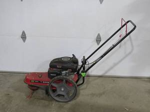 lot 8 image: Earthquake 28463 Walk-Behind String Mower 150-cc, 22-in Straight Shaft String Trimmer