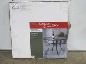 lot 57 image: Backyard Creations Harrison Brown Round Dining Patio Table 42 W x 42 L x 28-17 H