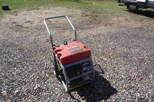 lot 10 image: Briggs & Stratton 5550 Watt8550 Watt Starting Watts Portable Wheeled Generator