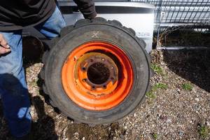 lot 14 image: Galaxy XD2010 Skid Loader Skid Steer Tire Mounted on 8 Bolt Rim