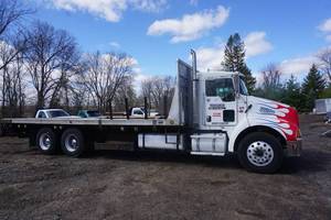 lot 1 image: 2005 Kenworth Model T-300 Flat Bed Semi Truck