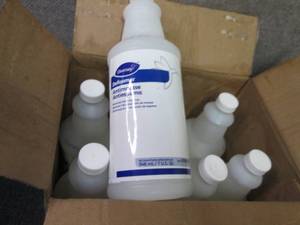 lot 14 image: 6 qts Diversey Defoamer...