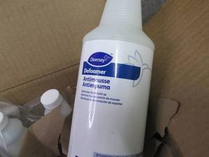 lot 25 image: 6 qts Diversey Defoamer...