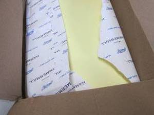 lot 64 image: Ream of 11x17 Canary Yellow Hammerm...