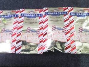 lot 157 image: 4- 4.57 oz Ghirardhelli Chocolate P...