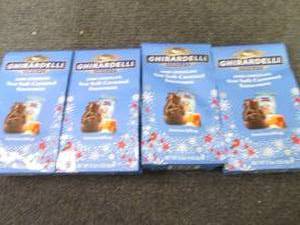 lot 165 image: 4- 4.1 oz Ghirardhelli Dark Chocola...