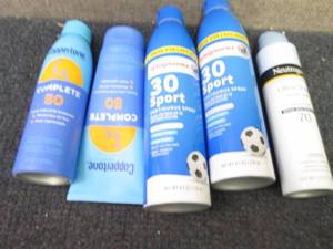 lot 247 image: 5 Assorted Sunscreen Products...