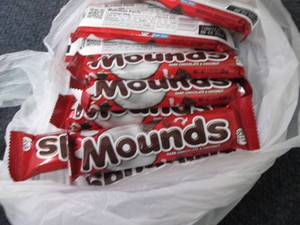 lot 394 image: 12- 1.75 oz Mounds Bars...