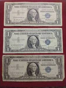 lot 19 image: (3) 1957 Silver Certificate $1 Bills