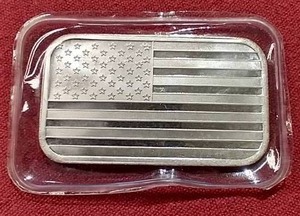lot 40 image: U.S. Flag 1 Oz. Silver Bar