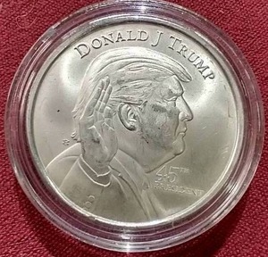 lot 70 image: Donald Trump 1 Oz Silver Round