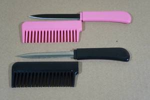 lot 182 image: 2 Hair Comb Knives