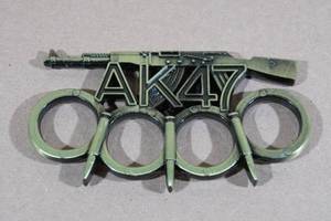 lot 190 image: Gun Paper Weight