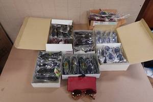 lot 106 image: Large Assortment of New Sunglasses