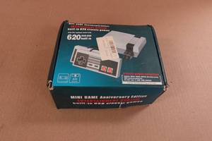 lot 233 image: Mini Anniversary Edition Game System with 620 Built-In Classic Games