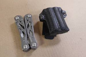 lot 239 image: Gerber Multi Tool with Clip-On Sheath