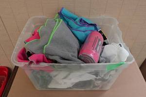 lot 470 image: Assorted Workout Gear - Yoga Towels, Padded Pants for Football, Weightlifting Gear