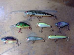 Seven assorted fishing lures Rapala, heddon, other