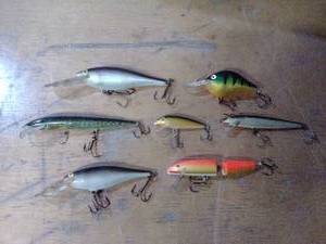 Seven assorted fishing lures Rapala, heddon, other