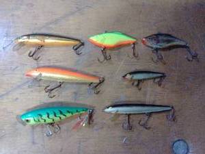 Seven assorted fishing lures Rapala, heddon, other