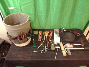 Bucket Boss full of assorted hand tools