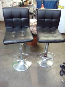 Two bar height adjustable chairs