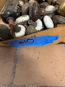 Flat of vintage door hardware