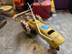 Metal tractor yard sprinkler