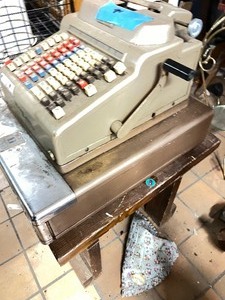 Vintage cash register and stand