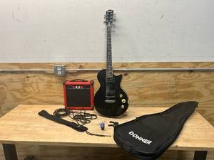 lot 79 image: DONNER Electric Guitar with LYX PRO Amplifier (AGL-20) and Accessories