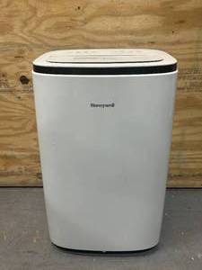 lot 80 image: HONEYWELL 12000 BTU Portable Air Conditioner Model HJ2CESWK8