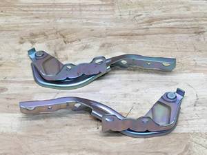 lot 106 image: NewYall pair left and right hood hinges
