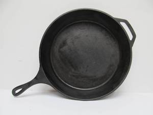 lot 12 image: LARGE Cast Iron LODGE Skillet