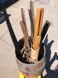 lot 287 image: Old Vintage Barrel FULL of Large Antique Logging Saws & Several Other Items