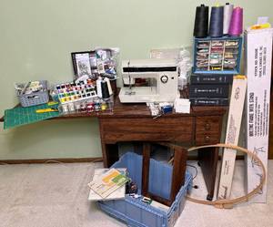 lot 24 image: Kenmore Convertible Sewing Machine Model 1980 with Edmunds Quilting Frame and Sewing Supplies