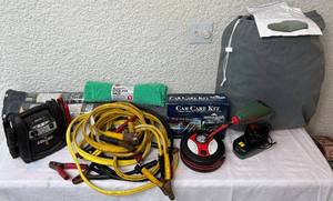 lot 46 image: Car Care Essentials-Car Cover, Inflator, Jumper Cables, Windshield Covers, Car Care Kit, Air Compressor and Microfiber Rags