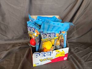 lot 51 image: Pokemon PEZ Despencers(12ct) and candy(24ct) Best By 62028