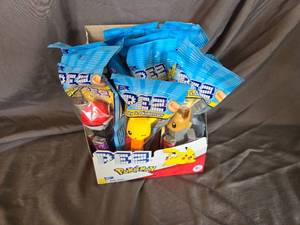 lot 48 image: Pokemon PEZ Despencers(12ct) and candy(24ct) Best By 62028