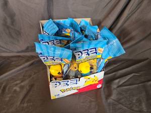 lot 49 image: Pokemon PEZ Despencers(12ct) and candy(24ct) Best By 62028