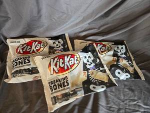 lot 41 image: 3 bags of KitKats white chocolate Best By 122024
