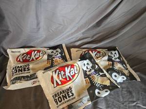 lot 43 image: 3 bags of KitKats white chocolate Best By 122024