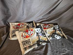 lot 45 image: 3 bags of KitKats white chocolate Best By 122024