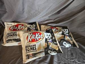 lot 46 image: 3 bags of KitKats white chocolate Best By 122024