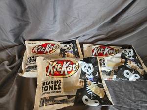 lot 36 image: 3 bags of KitKats white chocolate Best By  122024