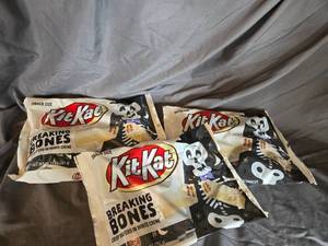 lot 38 image: 3 bags of KitKats white chocolate Best By 122024