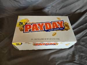 lot 26 image: Box of 24 Payday candy bars Best By  52024