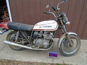 Suzuki early 80s GS750 . Used condition. Appears complete except for one cover. Turns over. No title. As shown.