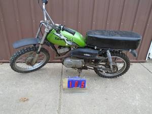 Mid 70s Kawasaki KD100. Been sitting for years. Was a good runner. Cuztom seat. Probably clean carb  run it. As shown.