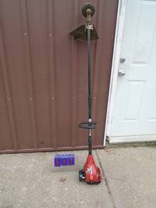 Homelite 2 cycle weed trimmer. Lightly used. Tested & works. As shown.